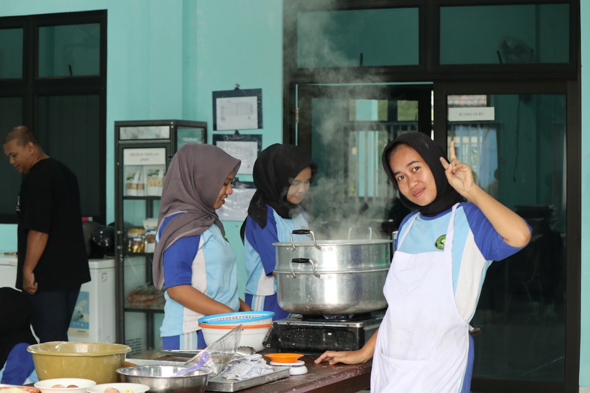 Student preparing healthy meal in kitchen